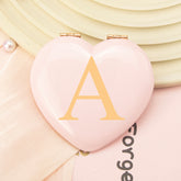 Rose Gold-Plated Heart-Shaped Mirrors with Printed Letters. Exquisite packaging, in stock, and available for mixed batches. Perfect for wholesale, international trade, and beauty industry clients. Elevate your inventory now!